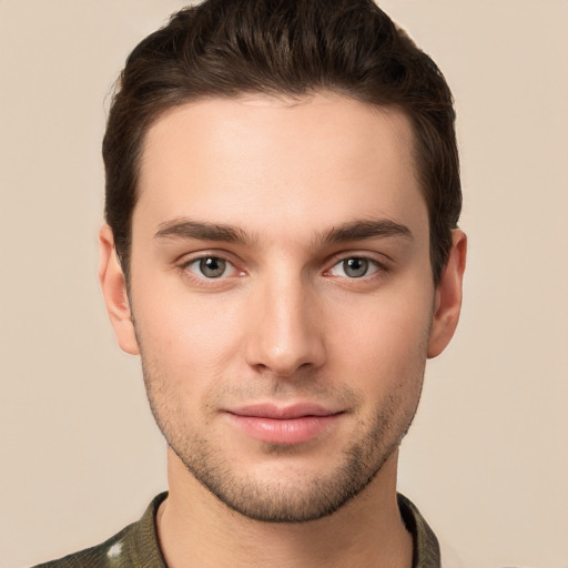 Joyful white young-adult male with short  brown hair and brown eyes