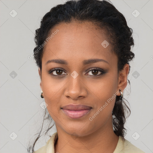 Joyful black young-adult female with medium  black hair and brown eyes