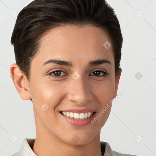 Joyful white young-adult female with short  brown hair and brown eyes