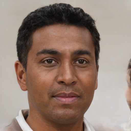 Neutral latino young-adult male with short  brown hair and brown eyes