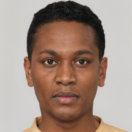 Neutral black young-adult male with short  black hair and brown eyes