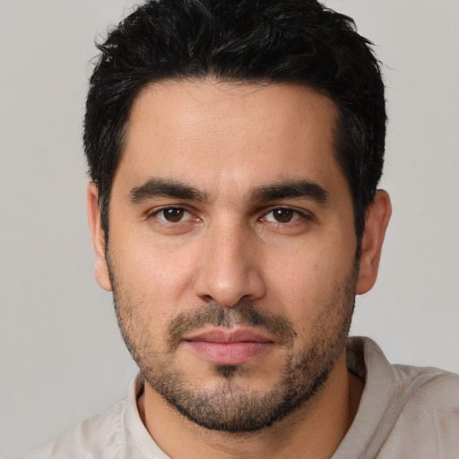 Neutral white young-adult male with short  black hair and brown eyes