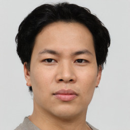 Neutral asian young-adult male with short  brown hair and brown eyes