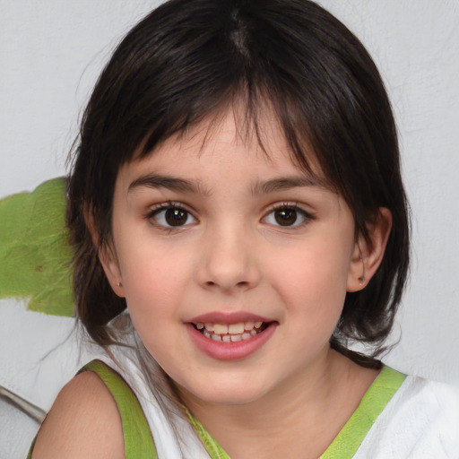 Joyful white child female with medium  brown hair and brown eyes