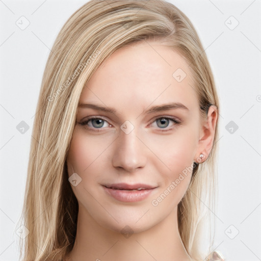 Joyful white young-adult female with long  brown hair and blue eyes