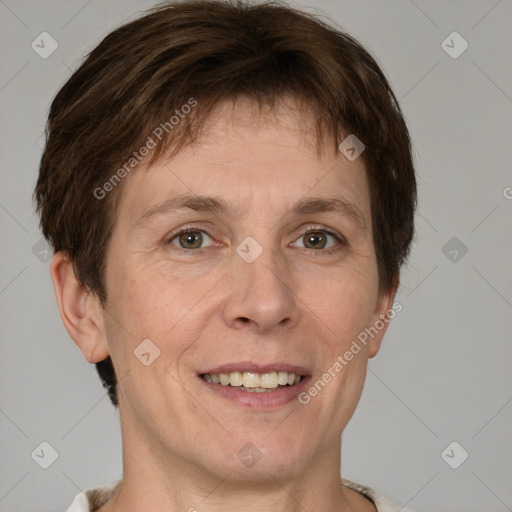 Joyful white adult male with short  brown hair and grey eyes