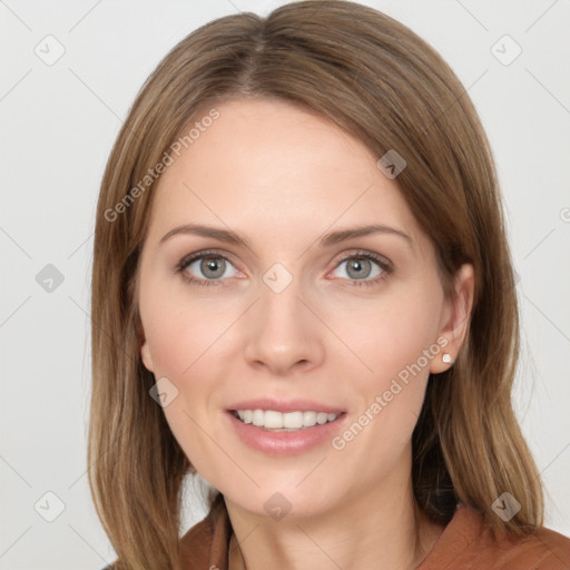 Joyful white young-adult female with long  brown hair and blue eyes