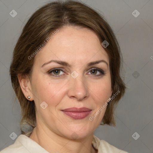 Joyful white adult female with medium  brown hair and grey eyes