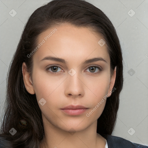 Neutral white young-adult female with long  brown hair and brown eyes