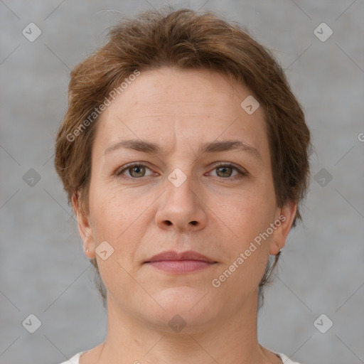 Neutral white adult female with short  brown hair and grey eyes