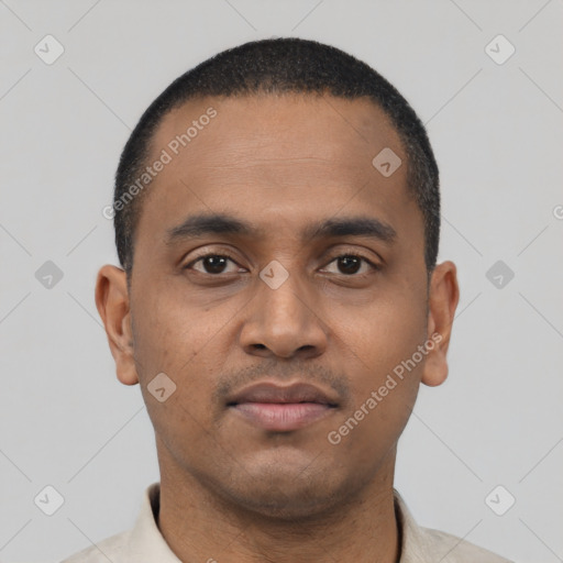 Neutral latino young-adult male with short  black hair and brown eyes