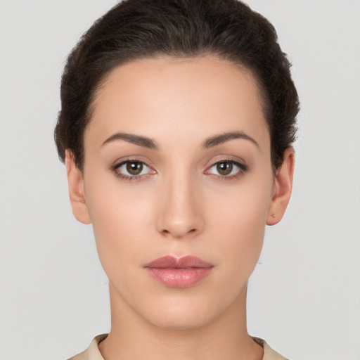 Neutral white young-adult female with short  brown hair and brown eyes