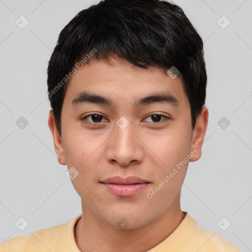 Joyful asian young-adult male with short  black hair and brown eyes