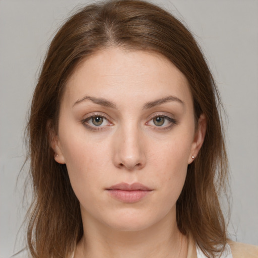 Neutral white young-adult female with medium  brown hair and grey eyes