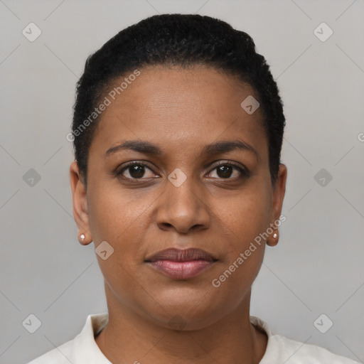 Joyful black young-adult female with short  black hair and brown eyes