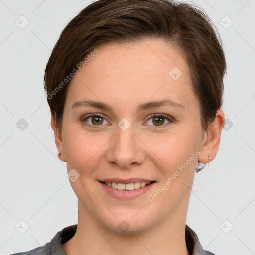 Joyful white young-adult female with short  brown hair and grey eyes