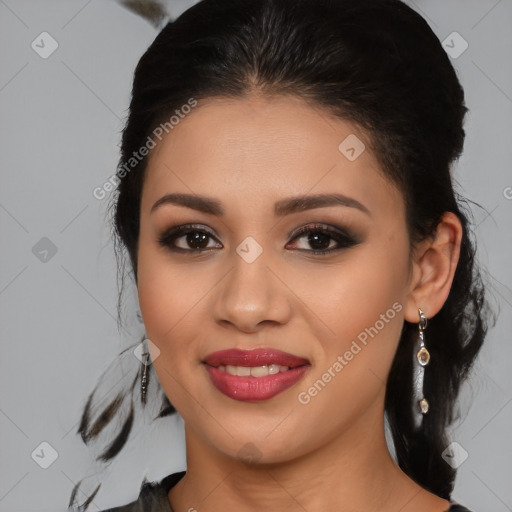 Joyful latino young-adult female with medium  brown hair and brown eyes