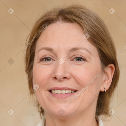 Joyful white adult female with medium  brown hair and grey eyes