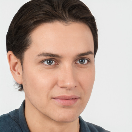 Joyful white young-adult male with medium  brown hair and brown eyes