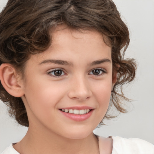 Joyful white child female with medium  brown hair and brown eyes