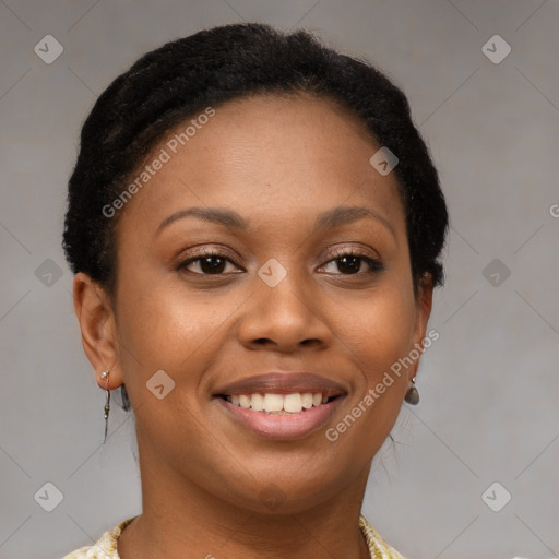 Joyful black young-adult female with short  brown hair and brown eyes