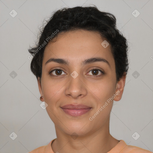 Joyful latino young-adult female with short  brown hair and brown eyes