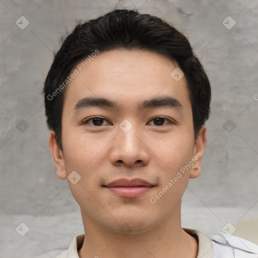 Joyful white young-adult male with short  black hair and brown eyes