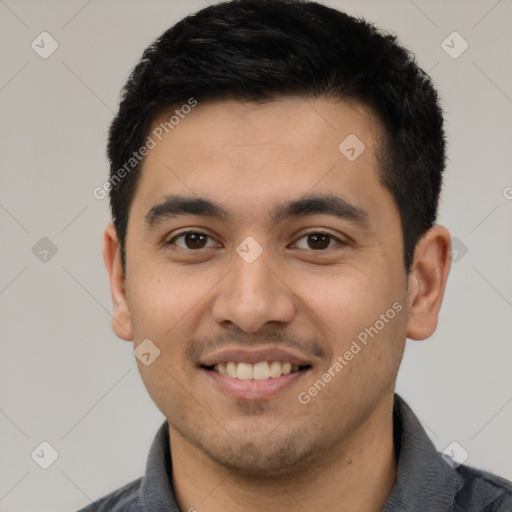 Joyful latino young-adult male with short  black hair and brown eyes