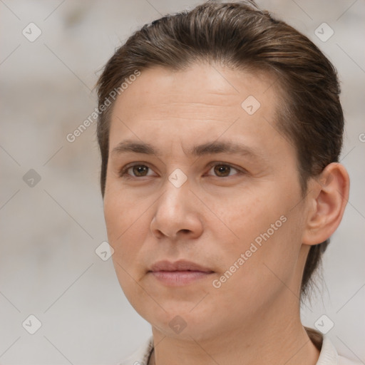 Joyful white adult female with short  brown hair and brown eyes