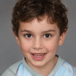 Joyful white child male with short  brown hair and brown eyes