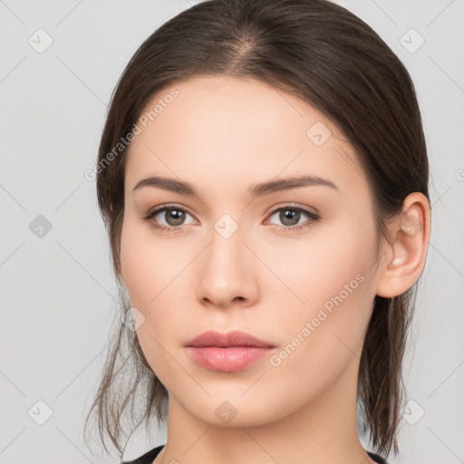 Neutral white young-adult female with medium  brown hair and brown eyes