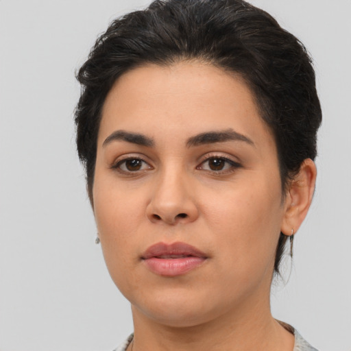 Neutral latino young-adult female with medium  black hair and brown eyes