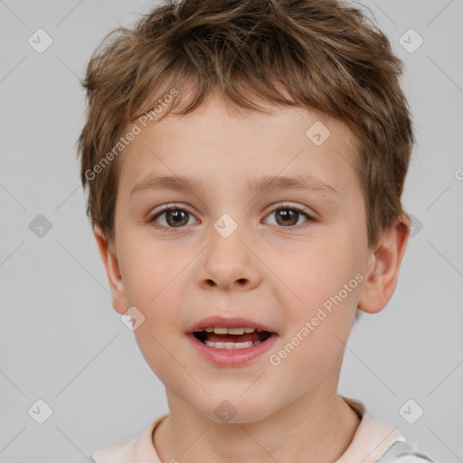 Joyful white child male with short  brown hair and brown eyes