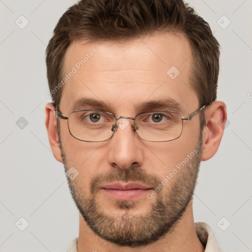 Joyful white adult male with short  brown hair and brown eyes