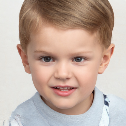 Joyful white child male with short  brown hair and brown eyes