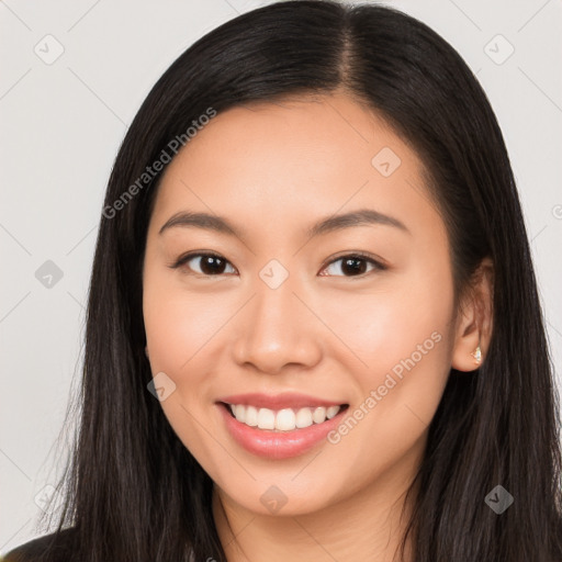 Joyful white young-adult female with long  black hair and brown eyes