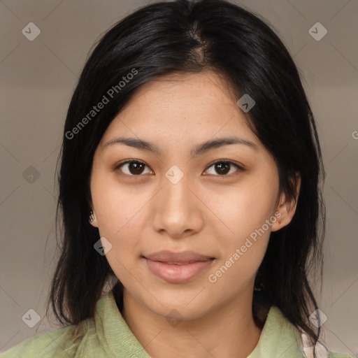 Joyful asian young-adult female with medium  black hair and brown eyes