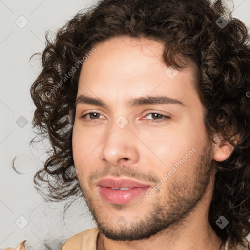 Joyful white young-adult male with medium  brown hair and brown eyes