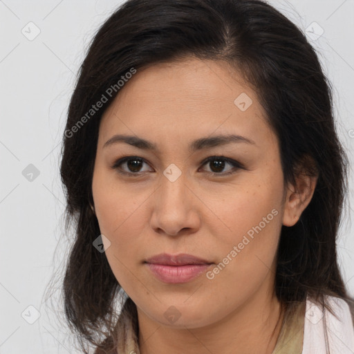 Joyful asian young-adult female with long  brown hair and brown eyes