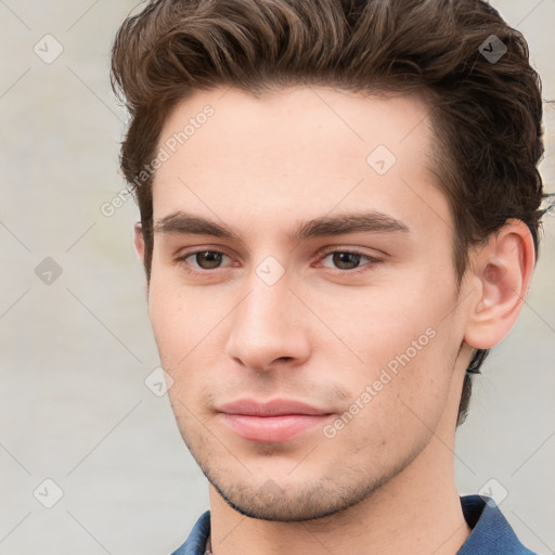 Neutral white young-adult male with short  brown hair and grey eyes