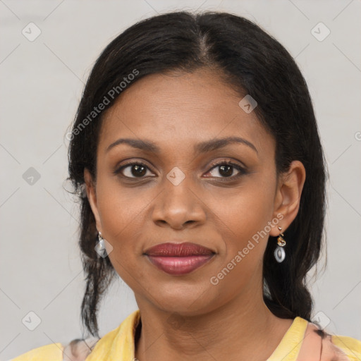 Joyful black young-adult female with medium  brown hair and brown eyes