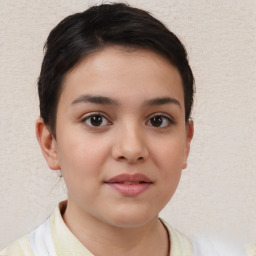 Joyful white child female with short  brown hair and brown eyes