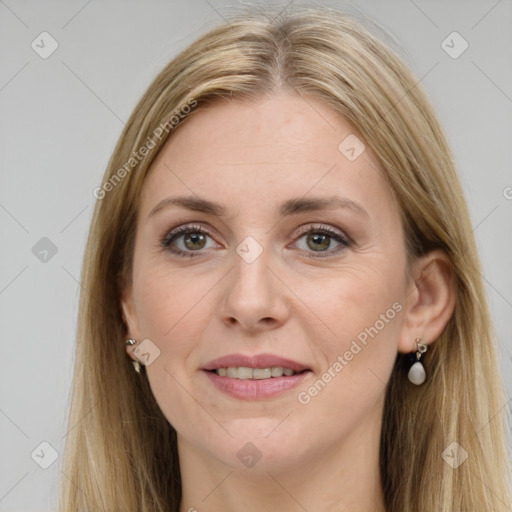 Joyful white young-adult female with long  brown hair and green eyes