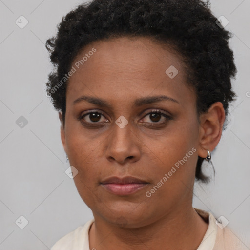 Neutral black young-adult female with short  brown hair and brown eyes