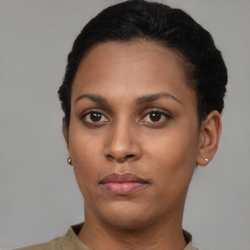 Neutral latino young-adult female with short  black hair and brown eyes