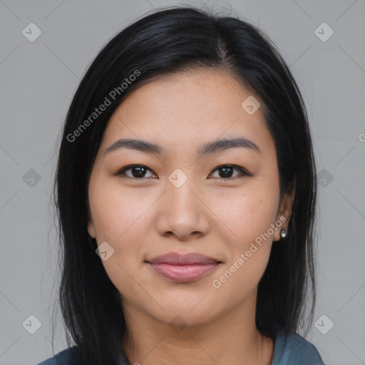 Joyful latino young-adult female with medium  black hair and brown eyes