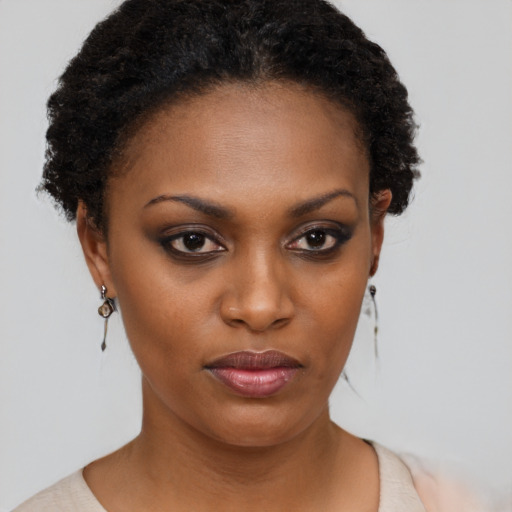 Neutral black young-adult female with short  brown hair and brown eyes