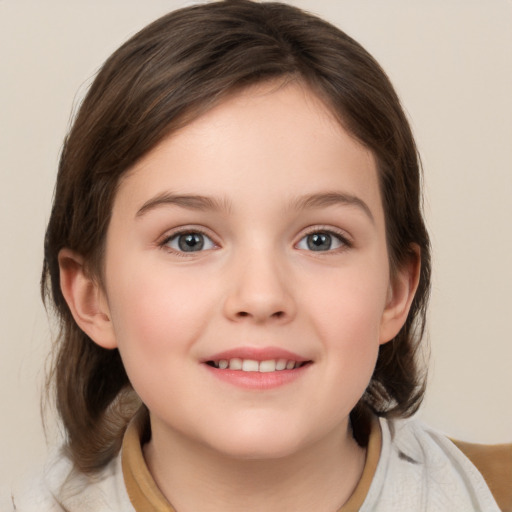 Joyful white child female with medium  brown hair and grey eyes