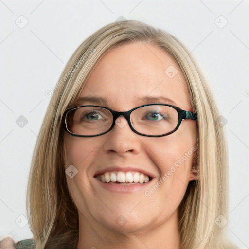 Joyful white young-adult female with long  brown hair and blue eyes