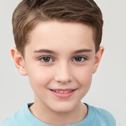 Joyful white child male with short  brown hair and brown eyes